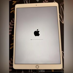 Apple iPad 3rd gen AIR Device with Black Logo on Screen